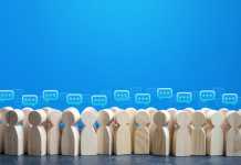 The Despair of American Youths under an Overly ‘Critical Society’ People figures with comment clouds above their heads. Social communication. Information exchange. Rumors and gossip. Talk and chat. Discussion and dialogue. Public opinion poll. Dispute settling