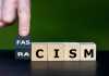 The Rise of Extremist Views in the 21st Century: How Children Are Key to Breaking or Maintaining the Cycle of Violence Cubes form the words racism and fascism. Symbol that racism leads to fascism.
